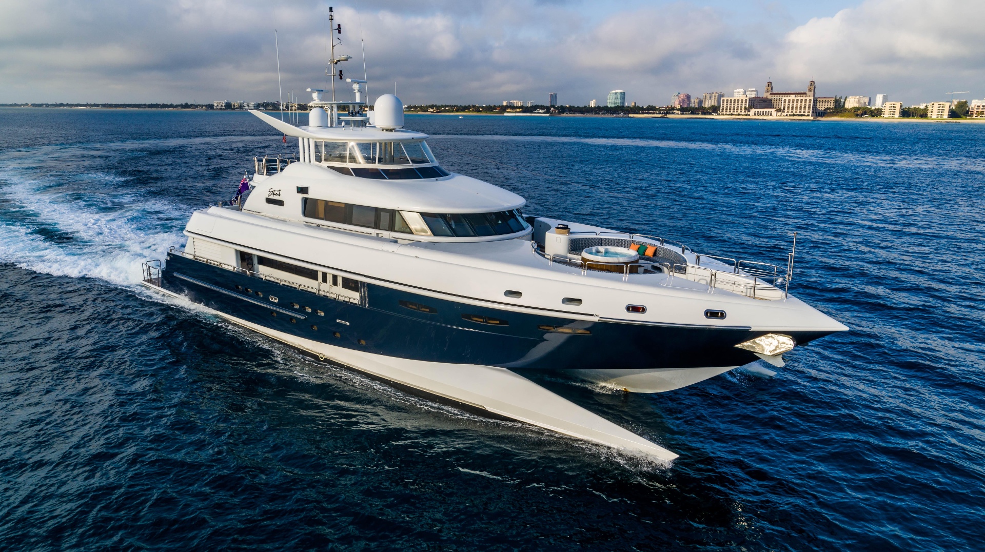 M/Y Spirit cruising past Palm Beach at sunrise